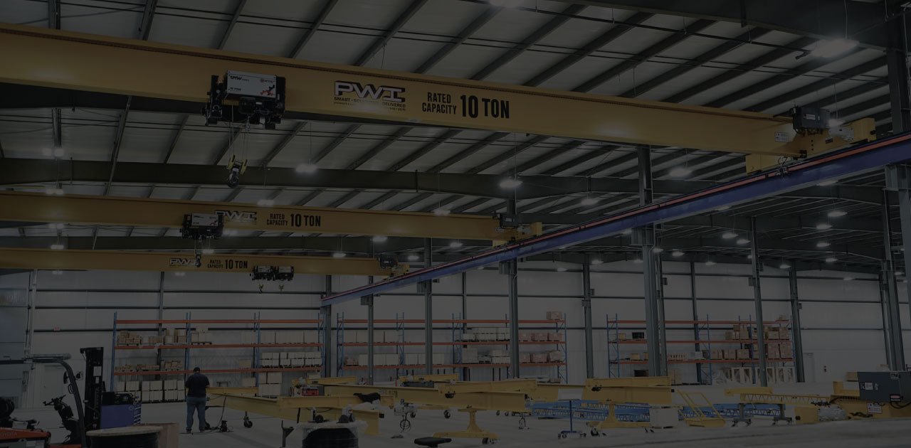 Overhead cranes in a fabrication warehouse