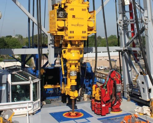 Top drive drilling equipment on a rig floor